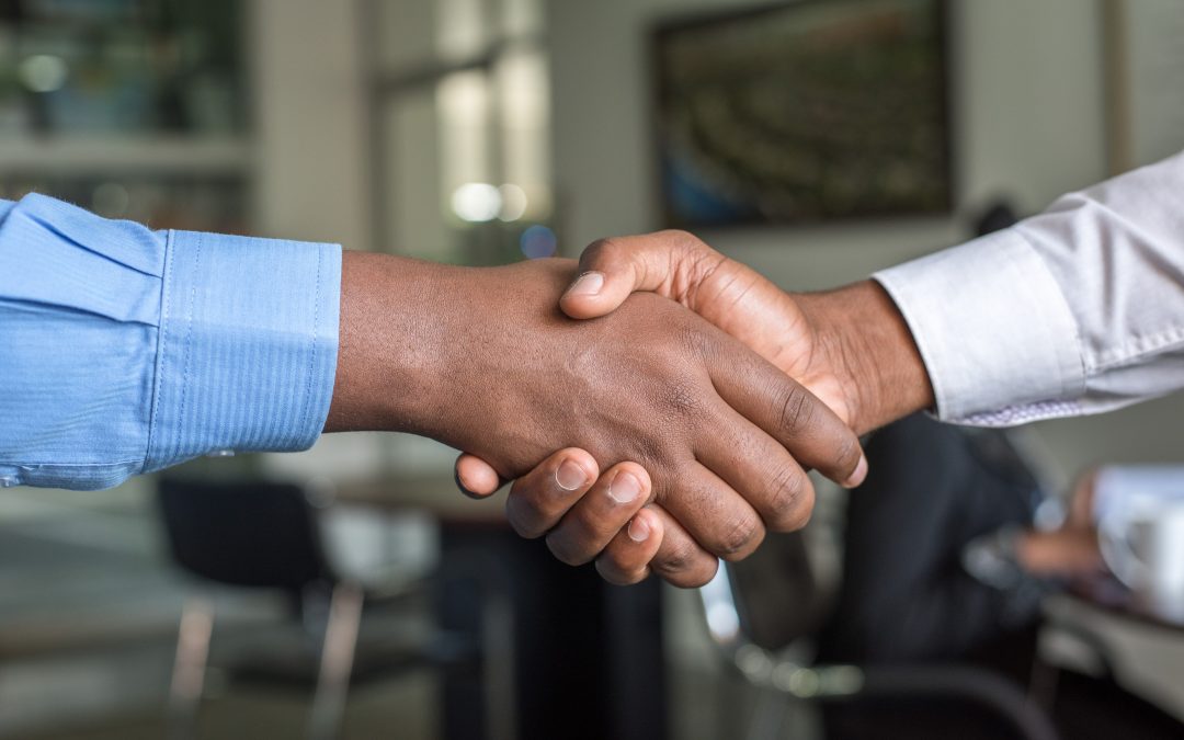 Black and White shaking hands